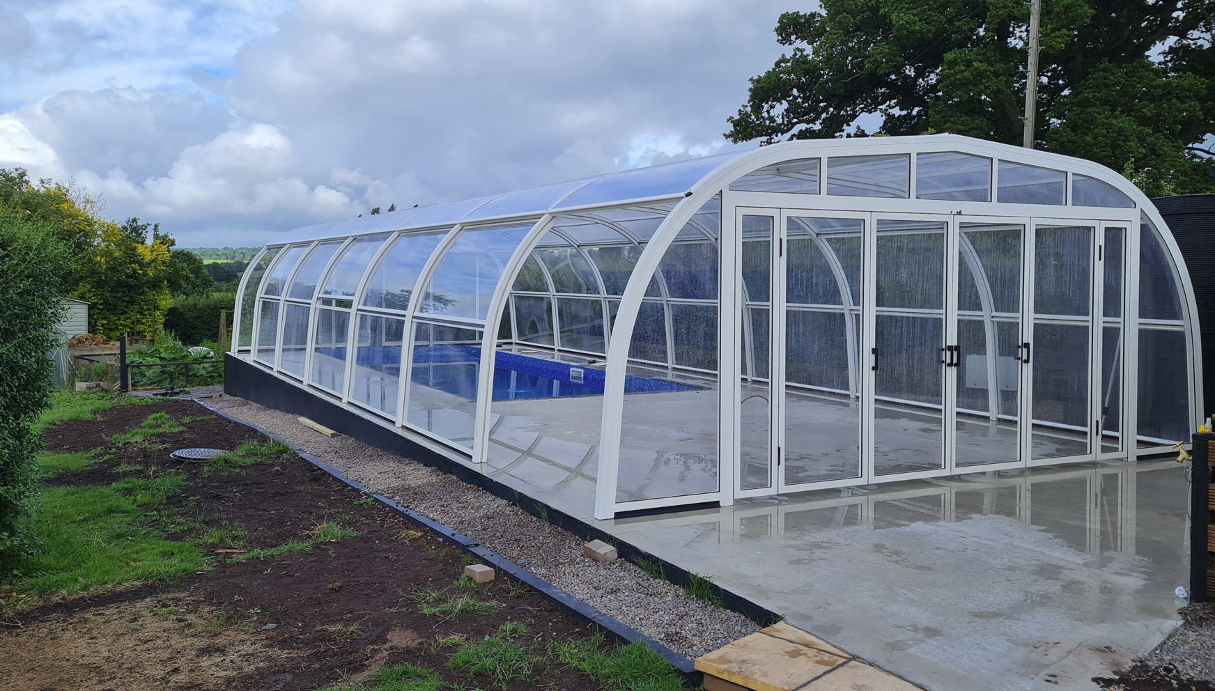 Galaxy-Seven-Bay-Arched-Pool-Enclosure-in-White-01